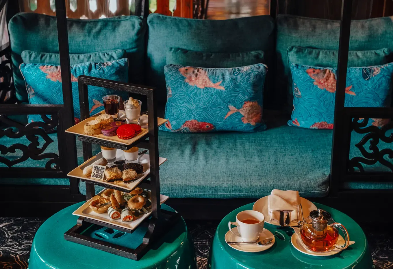 Afternoon tea service on the veranda at 137 Pillars House Chiang Mai