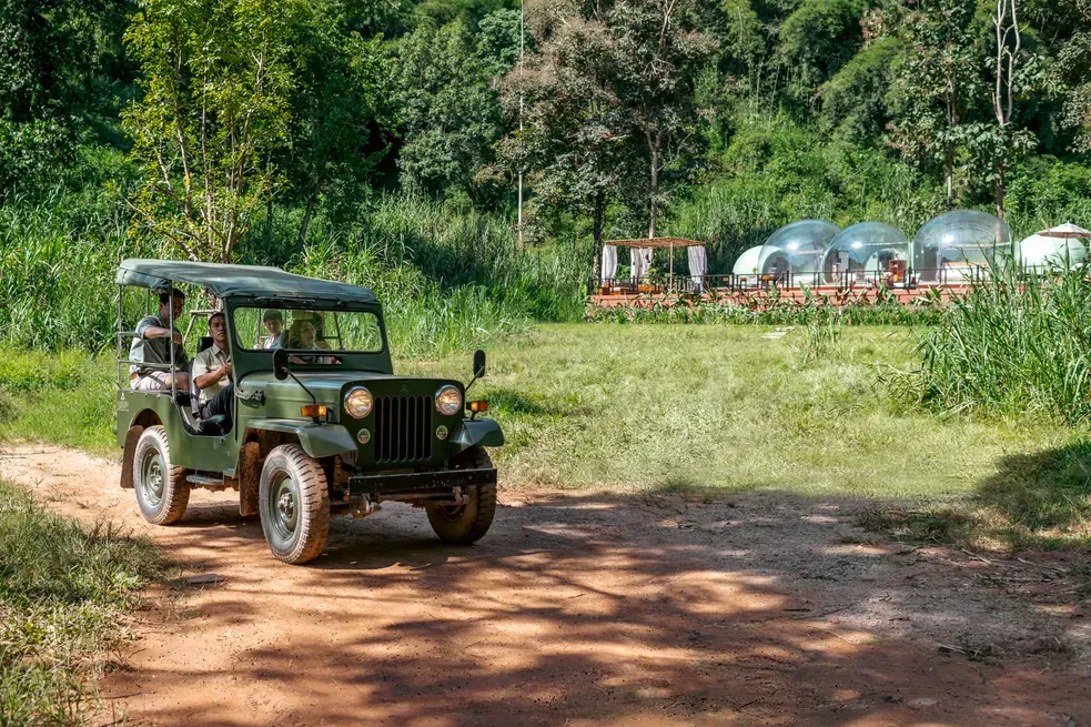 Jeep safari through the jungle at Anantara Golden Triangle Elephant Camp & Resort