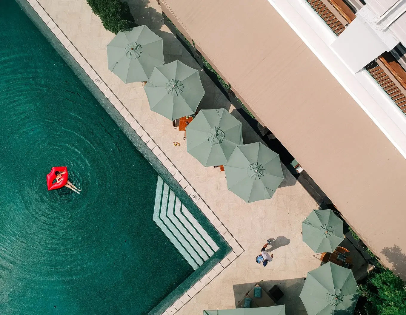 Aerial view of the swimming pool and gardens at The Sukhothai Bangkok