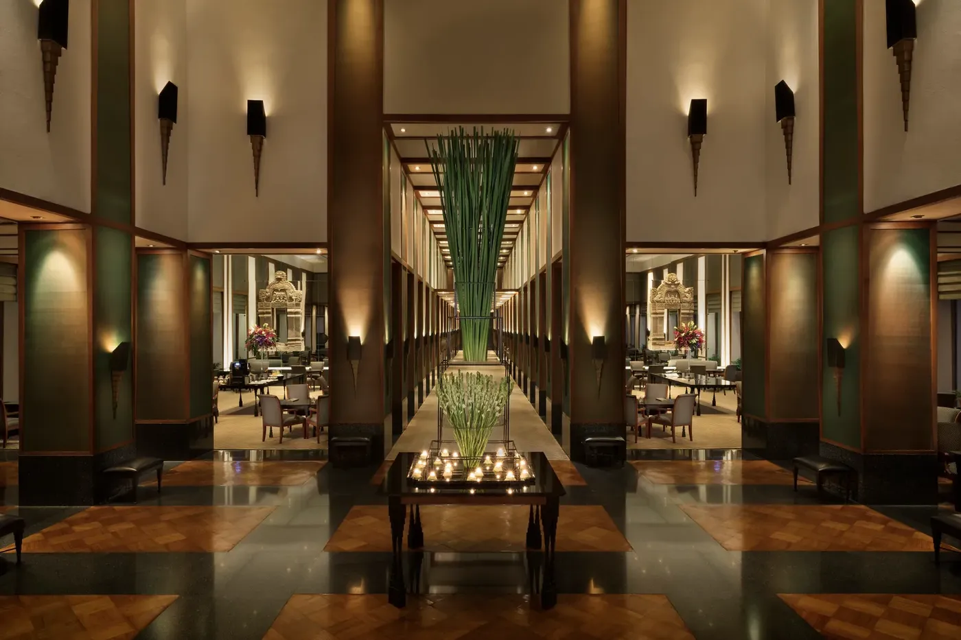 The teak-and-silk lobby of The Sukhothai Bangkok, designed by Edward Tuttle.
