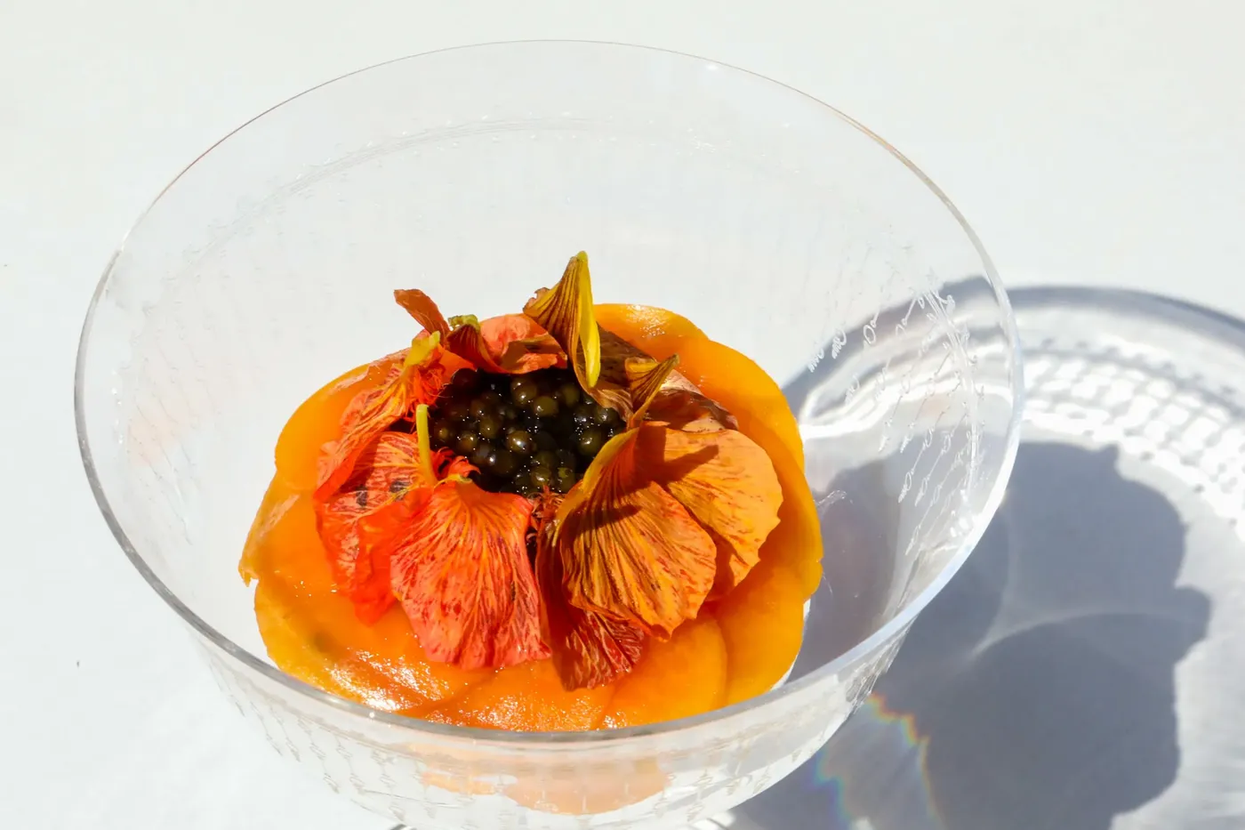 COTE Slicing trough a Papaya Hamachi Fish 🐟 Tar Tar, Red Papaya, Kristal Kaviari Caviar for Capella Bangkok Dining Experiences: Côte, Phra Nakhon, Stella & Tea Lounge.